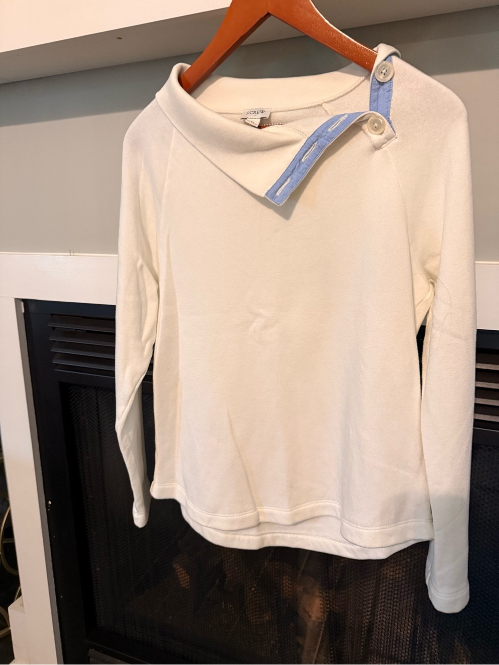 J Crew white light weight sweatshirt with a 4 button turn down collar. Medium